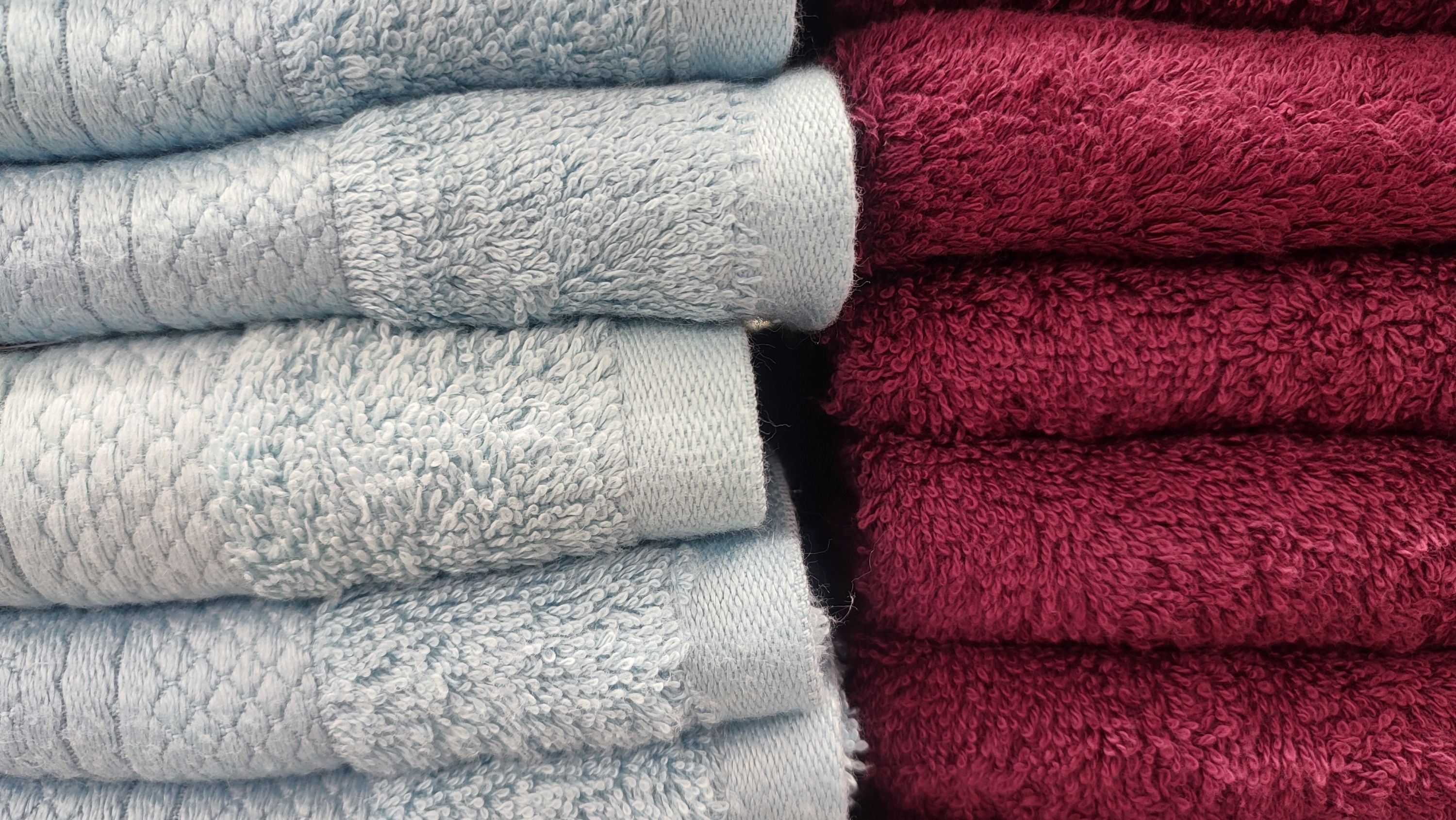 Red And Grey Towels Shutterstock 2611746025